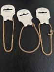 Partij van 3 goudkleurige enkelbandjes 