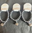 3 parel armbanden kleur grijs